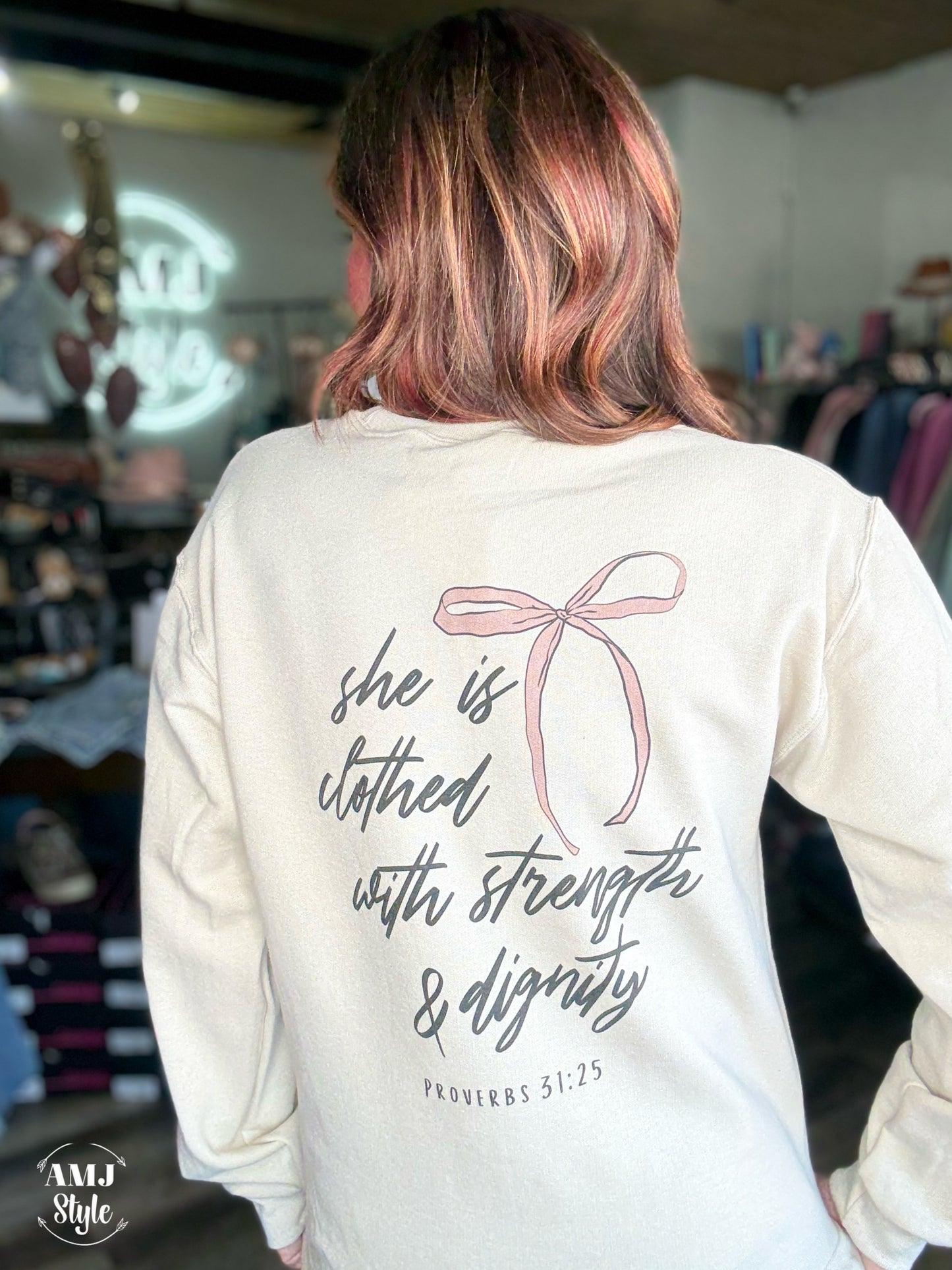 She is Clothed Sweatshirt